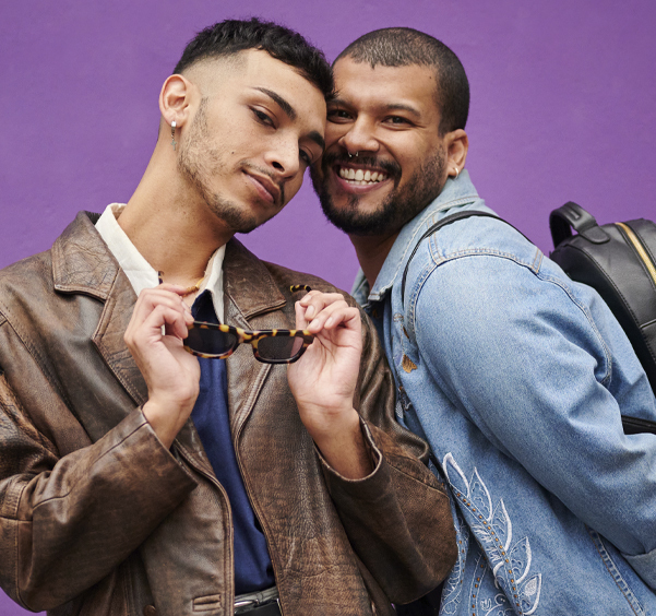 Two men smiling at camera